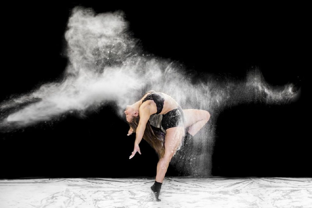 A dancer leaping gracefully